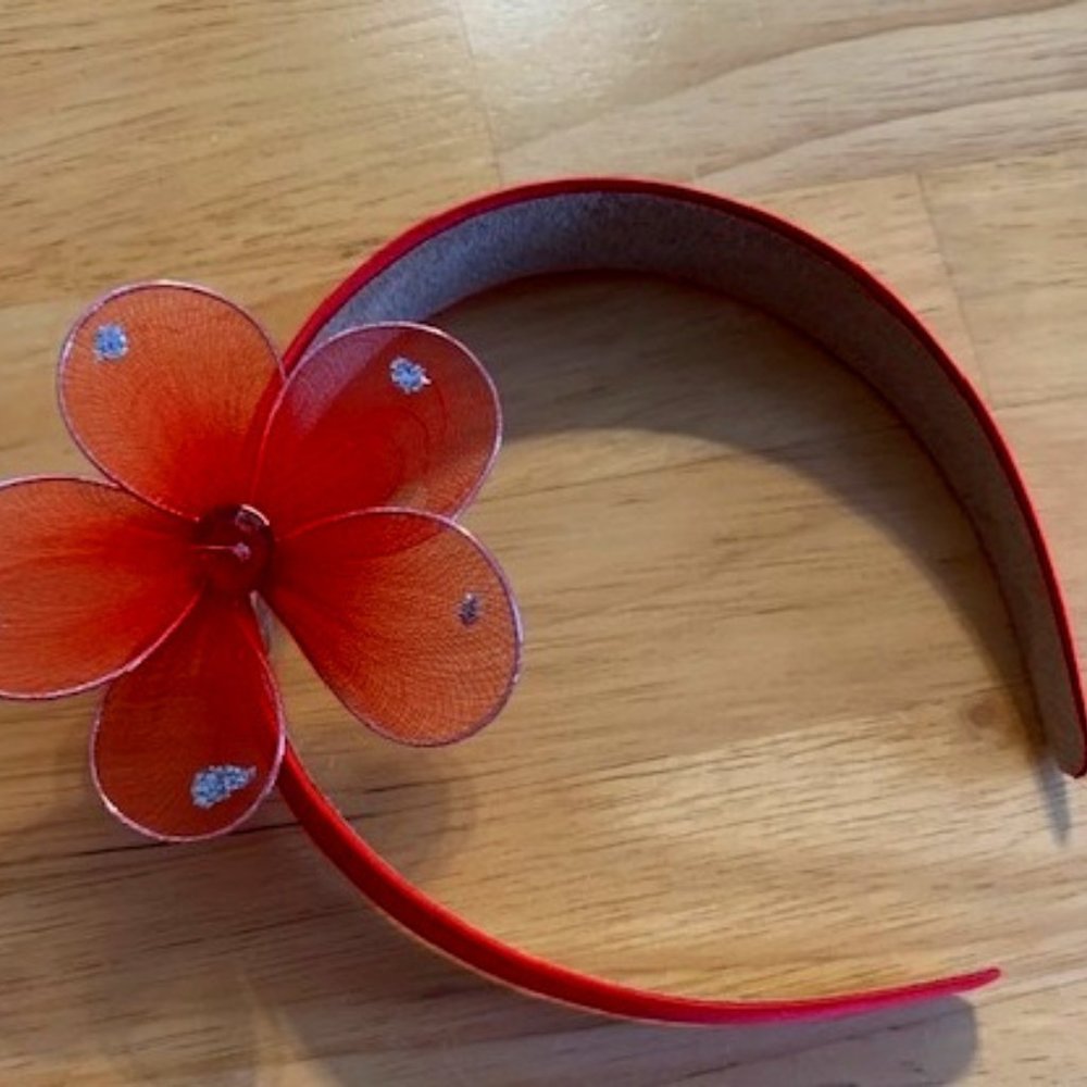Red Headband with Floral Adornment